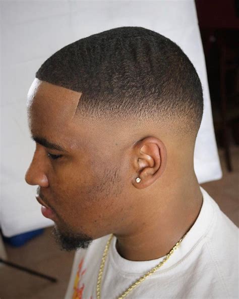 low fade haircut styles black|low taper black person.